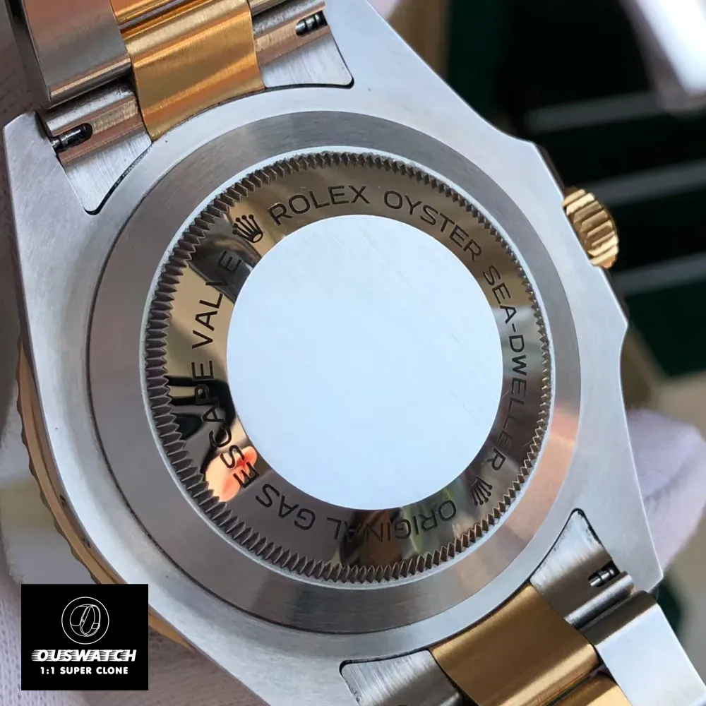 Macro view of titanium caseback with Rolex coronet and serial number engravings