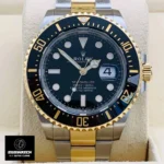 Front view of 43mm Rolesor Sea-Dweller with sunburst black dial and Cyclops date magnifier