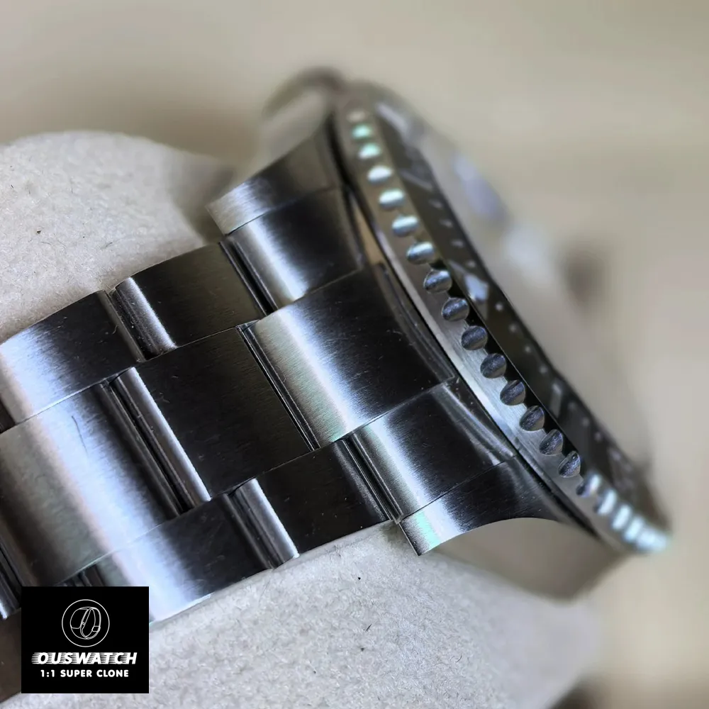 Macro view of Rolex Oystersteel surface, showing corrosion-resistant 904L stainless steel finish