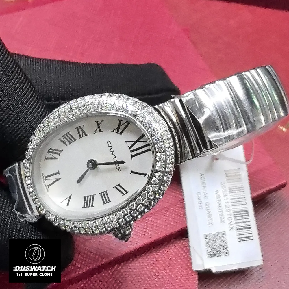 Detailed close-up of Cartier Baignoire WJBA0020 bezel with precision-set diamonds.