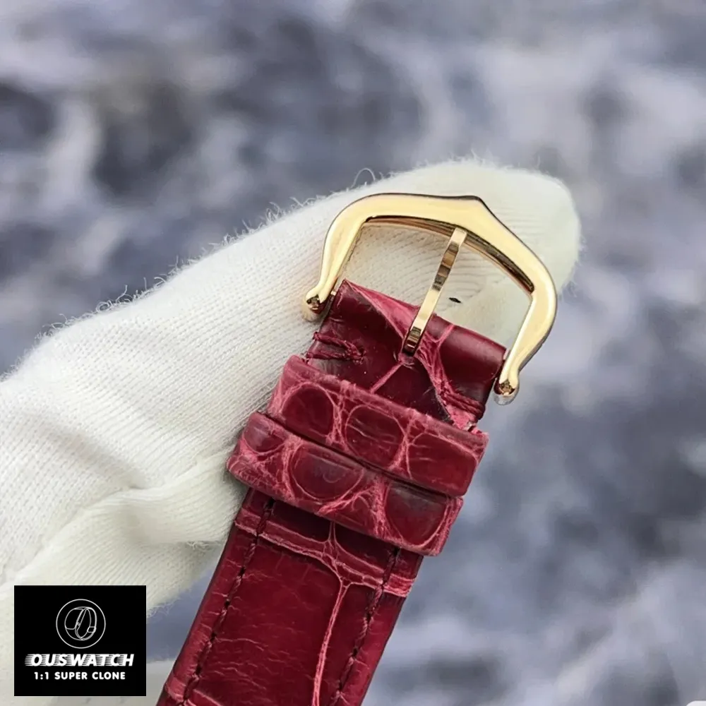 Cartier Ballon Bleu 33mm rose gold ladies watch featuring leather strap and classic pin buckle.