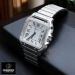 Side profile of the Cartier Santos Men’s WSSA0029 Super Clone watch, highlighting the white dial and stainless steel bracelet