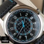 Macro close-up of the Calatrava 6007G-011’s carbon fiber dial texture and applied white gold hour markers