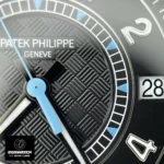 Detailed close-up of the Calatrava 6007G-011’s dial with white gold hour markers and sky-blue hands under natural light.