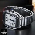 New Cartier Santos WSSA0029 Super Clone watch lying on its side on a tabletop, illustrating its slim 35.1 mm profile