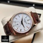 Patek 6119R-001 replica watch in rose gold displayed at 45° angle inside luxury watch box.