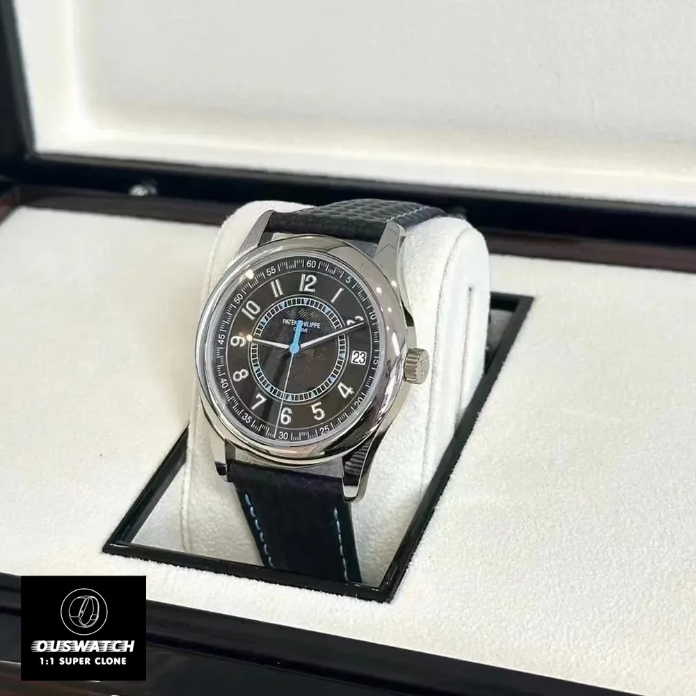  Front view of the Patek Philippe Calatrava replica 6007G-011 in its packaging, with the carbon fiber strap visible.