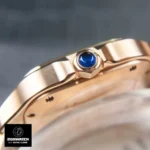 Side-profile of the Cartier Santos Super Clone WGSA0031 in rose gold, featuring its polished case and patented faceted crown