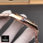 Rolex Land Dweller 36 mm Rose Gold watch Side crown close-up