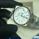 rolex-land-dweller-oystersteel-watch-on-table-super-clone