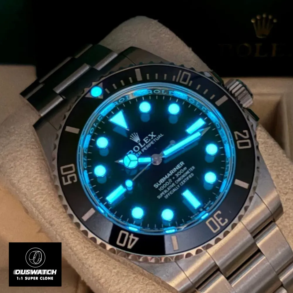 Super clone Rolex Sub 124060 Watch display under low light, illustrating the green-glow Chromalight luminescence on indices and hands