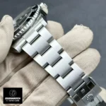 Close‐up of the super clone Rolex Submariner stainless steel bracelet detail, emphasizing the solid Oyster links and brushed center finish.