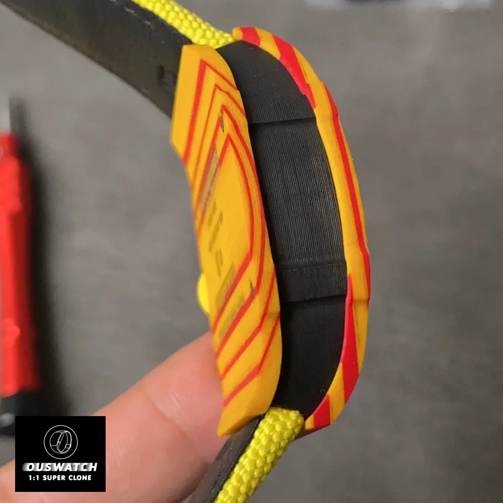 Side profile of the Richard Mille RM 27‑03 Rafael Nadal super clone watch, highlighting the Quartz TPT® carbon fiber case.