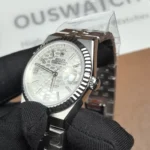 Rolex Land Dweller 127334 bezel close-up