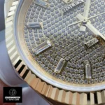 Close-up of the fluted bezel and diamond-set dial on the Rolex Day-Date 40 model 228238-0054.