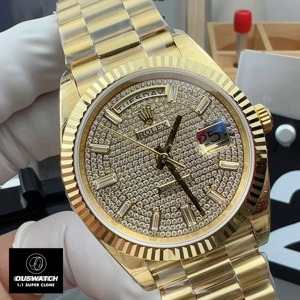 Rolex iced-out Day-Date 40 yellow gold watch (228238-0054) shown at a 120-degree angle, highlighting the case shape and shine.