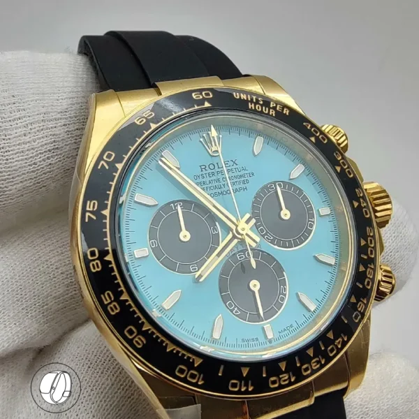 Replica golden Rolex Daytona 126518LN with turquoise blue (Tiffany) dial display