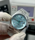 45‑degree angle view of Rolex 127336 Ice Blue dial Replica watch
