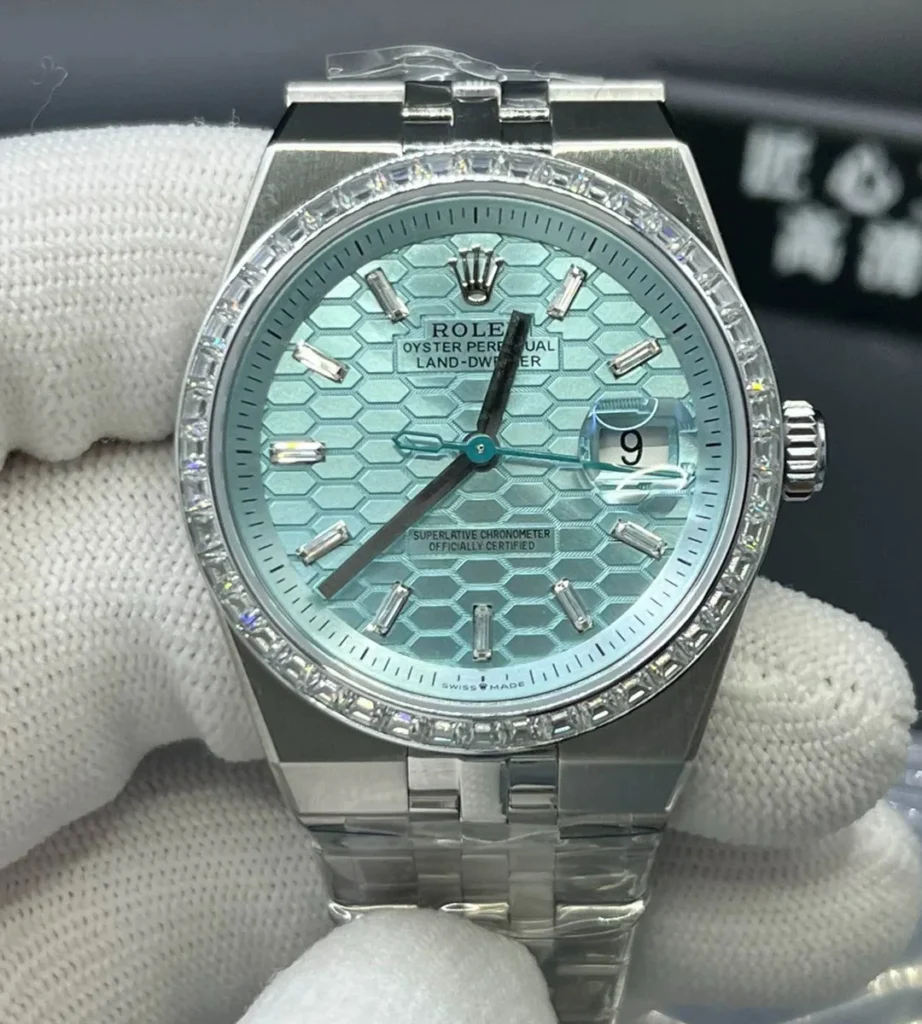 Replica Rolex Land‑Dweller 40 m127386tbr front view featuring diamond bezel and Ice Blue dial