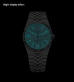 Replica Rolex Land‑Dweller Ice Blue dial glowing in low‑light conditions