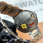 Backside of the Cartier Ballon Bleu 33mm diamond model in stainless steel, showing engraving and caseback finish.