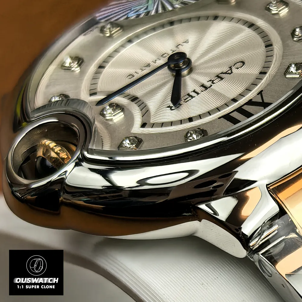 Close-up of the stainless steel case detail on the Cartier Ballon Bleu 33mm, showing brushed sides and polished bevels.