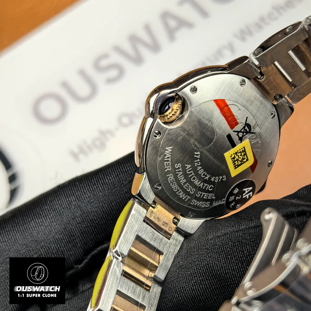 Rear view of the Cartier Ballon Bleu 33mm two-tone watch, displaying the caseback and bracelet attachment.