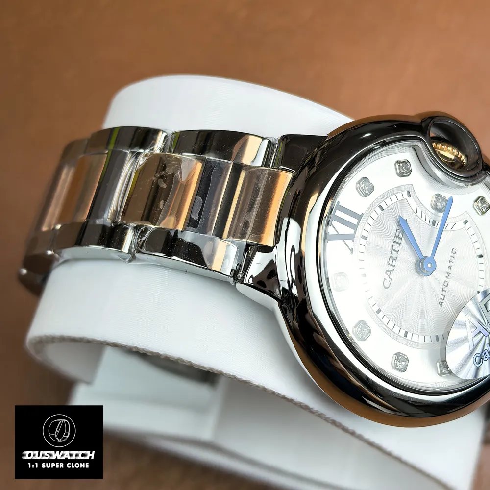 Detailed view of the Cartier Ballon Bleu two-tone bracelet links and brushed/polished surfaces.