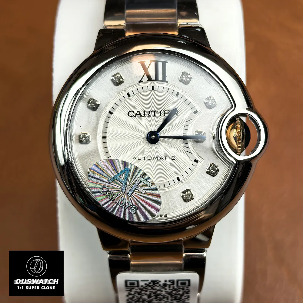 Front-facing display of the Cartier Ballon Bleu 33mm two-tone watch with silver dial, Roman numerals, and elegant bezel.
