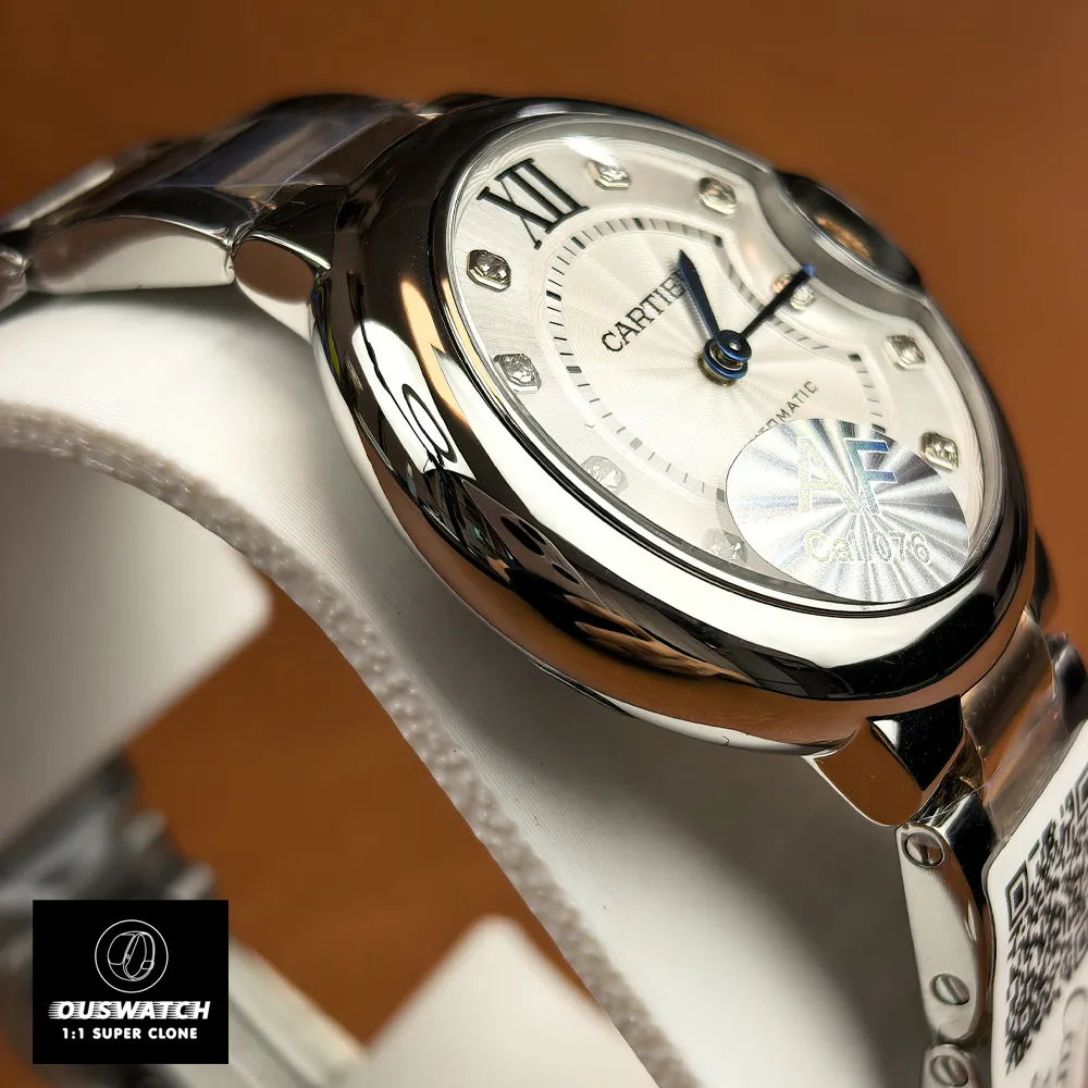 Side view showing the polished finishing process on the Cartier Ballon Bleu 33mm two-tone case.