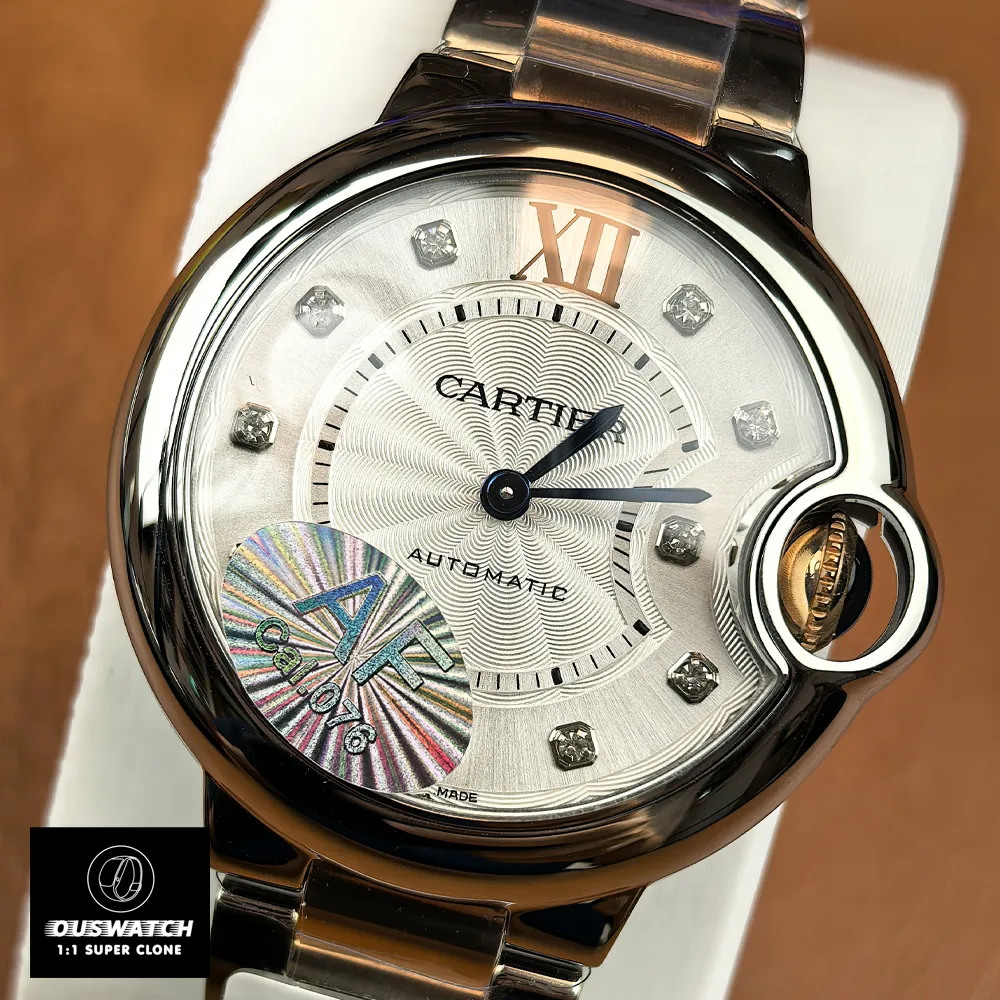 Front view of the Cartier Ballon Bleu 33mm two-tone watch with silver sunray dial and Roman numerals.