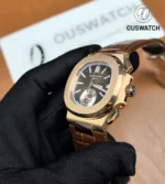 Detail view of the rose gold case and crown on the Patek Philippe Nautilus 5980/1R