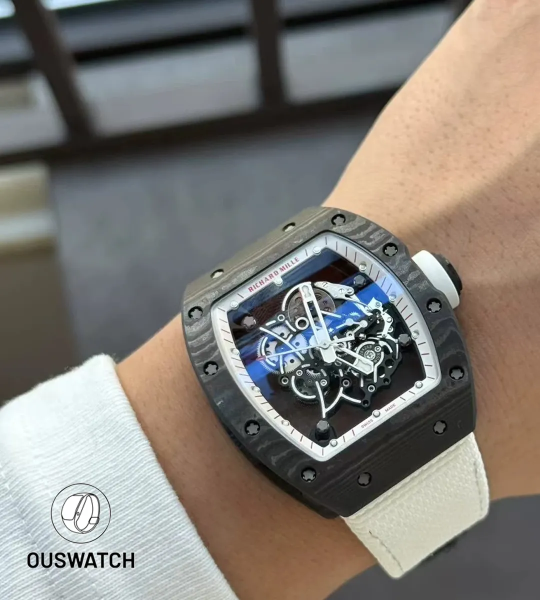 Richard Mille RM 055 Bubba Watson replica watch worn on wrist with white rubber strap.