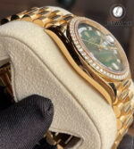 Satin-brushed finish on the side case of the Rolex 128348RBR Day-Date 36, paired with a full diamond dial and refined crown design.