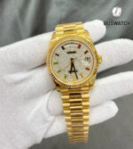 Full display of the Rolex Day-Date 36 iced-out diamond watch, showing the pavé diamond dial and bezel in yellow gold.