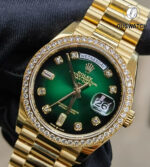 75-degree front angle of the Rolex Day-Date 36 iced-out watch featuring a rich green ombre dial and diamond accents, reference 128348RBR.