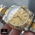 120-degree perspective highlighting the champagne dial of the Rolex Datejust 41 126333 with light reflections on the crystal.