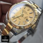 45-degree angle shot of the Rolex 126333 showcasing the sunburst champagne dial and applied hour markers.