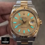 Rolex 126333-0009 Two-Tone Datejust displayed under low ambient light, emphasizing the gold accents.