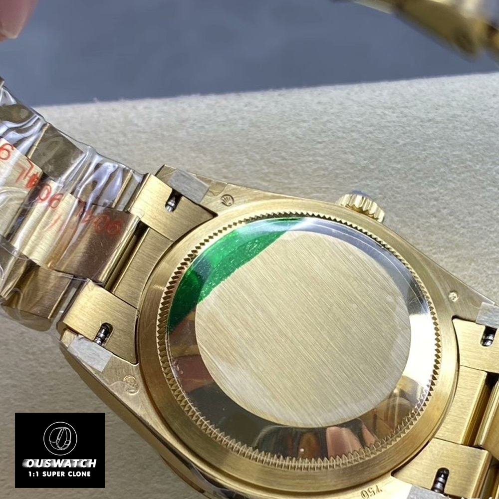 Backside view of Rolex 228348RBR President watch, showing caseback and bracelet attachment.