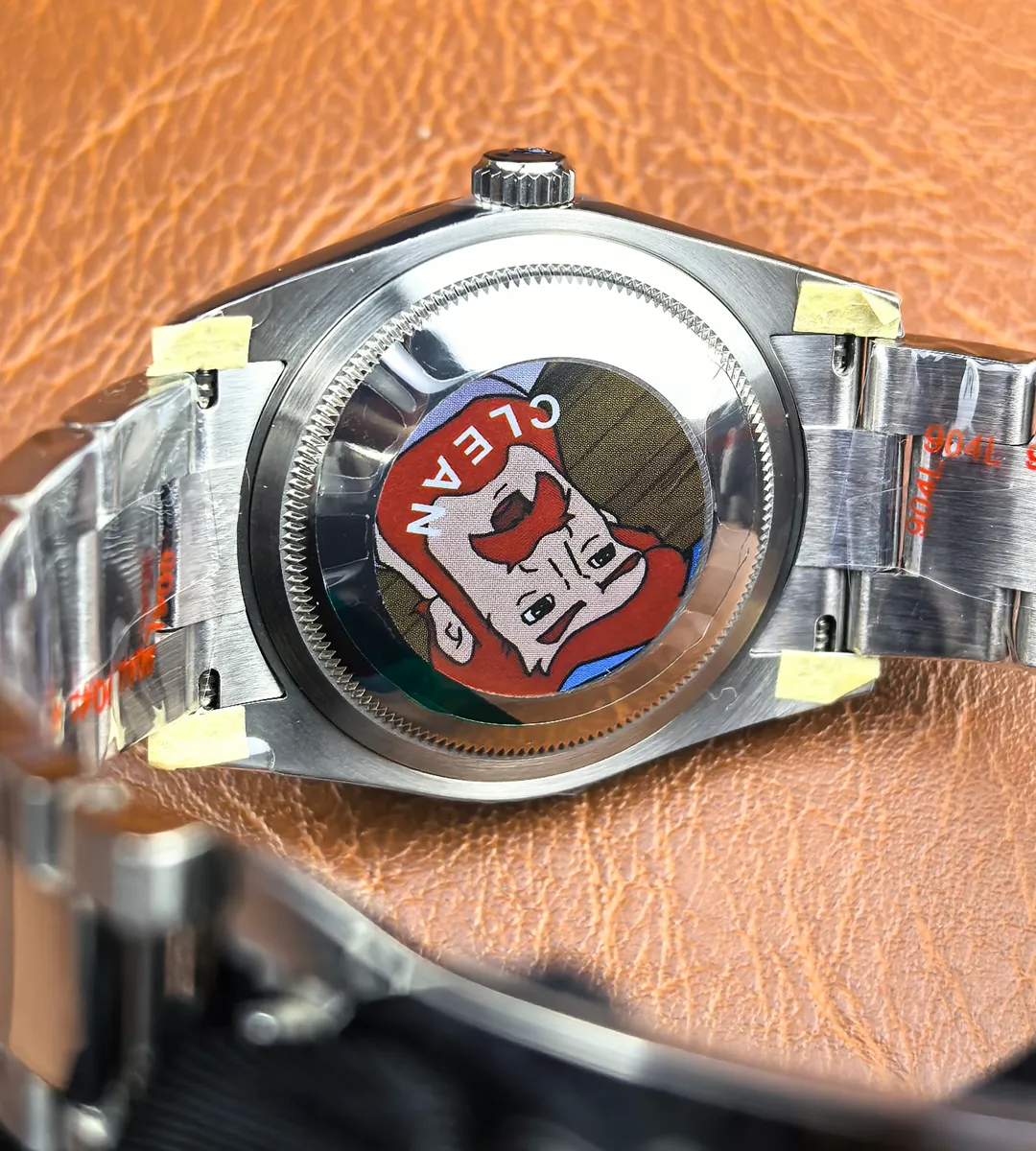 Back view of Rolex Datejust 36mm 126200-0006 showing caseback and bracelet attachment.