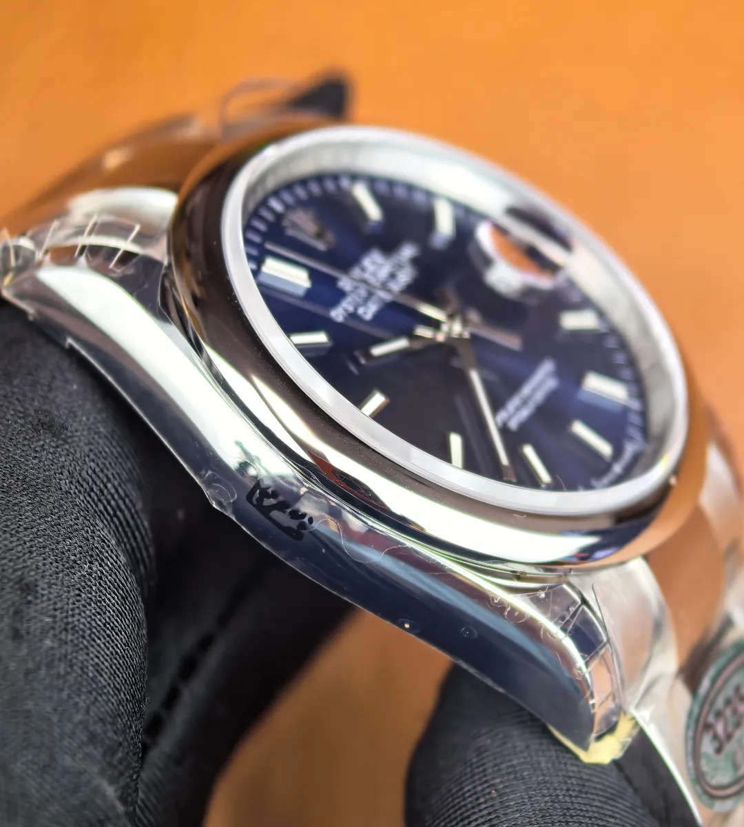 Side profile of Rolex Datejust 36mm 126200-0006 blue dial showing stainless steel case thickness.