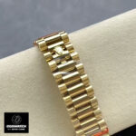 Rolex Day-Date 40 228348RBR with yellow gold President bracelet, full bracelet and clasp visible.