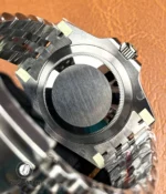 Rear view of the Rolex GMT-Master II 126710BLNR showing caseback and bracelet endlink junction.