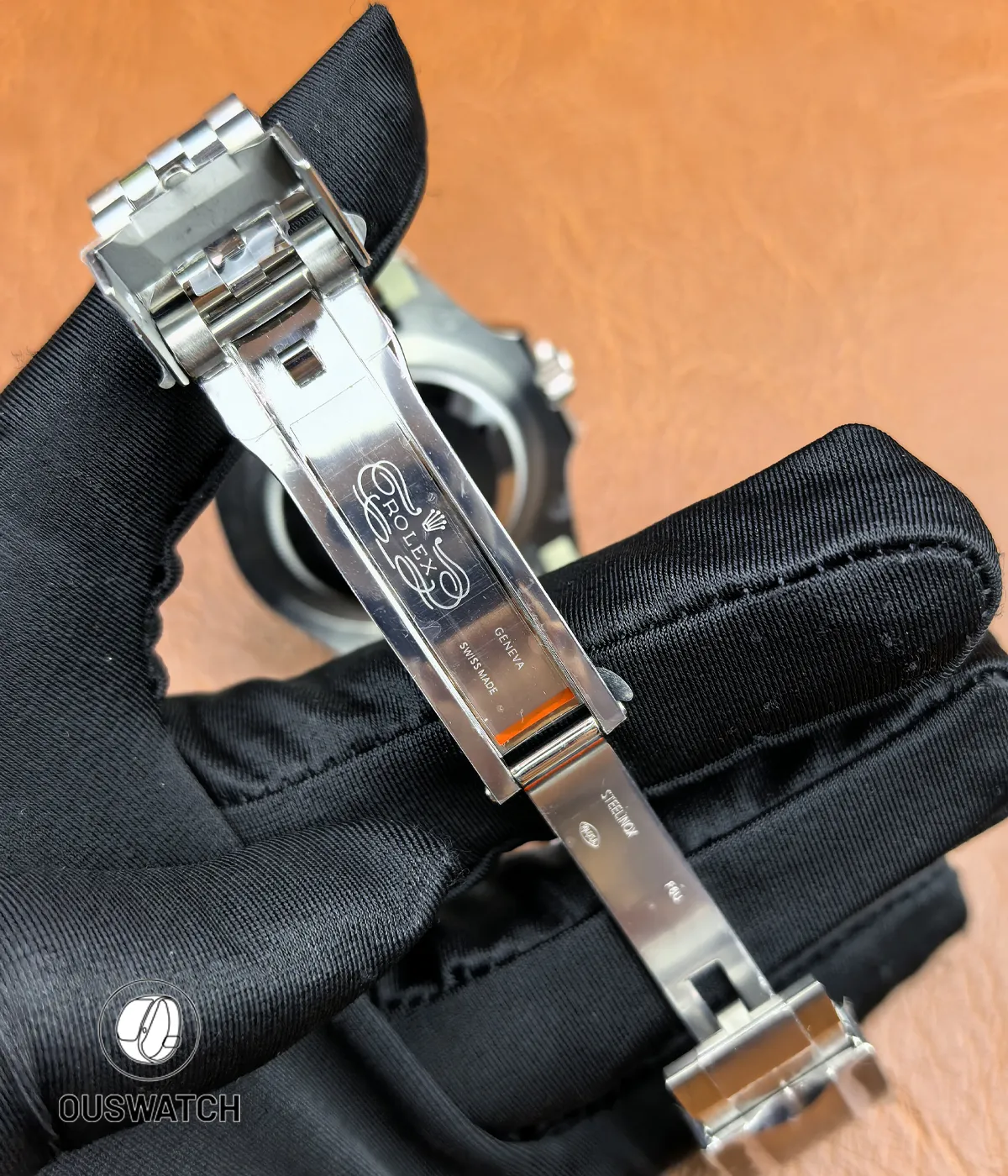 Fully unfolded folding clasp of the Rolex GMT-Master II Batgirl 126710BLNR, revealing the clasp mechanism.