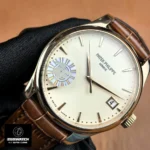 45-degree close-up of the Calatrava 5227R-001 dial — hour markers, date window and textured dial visible.