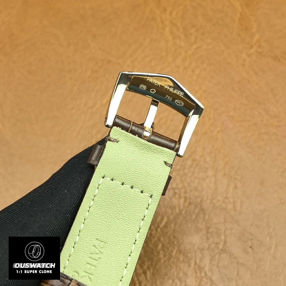 Close-up of the Patek Philippe logo engraved on the tang buckle of Calatrava 5227R-001.