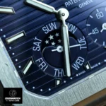 Detailed view of the moon phase and weekday subdial on the Patek Philippe Cubitus 5822p-001.