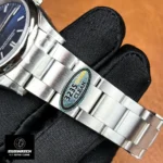 Close detail of the Oyster bracelet links, showing brushed surfaces, polished edges and link articulation.