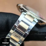 Cartier Ballon Bleu 33mm women's watch with rose gold and steel two-tone bracelet — full bracelet display.